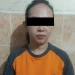 Tersangka emak-emak Wonosari berinisial RL usai diamankan di Polsek Wonosari.