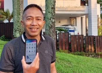 Mustakim, salah satu petugas KPPS di Kelurahan Bareng, Kecamatan Klojen, Kota Malang.