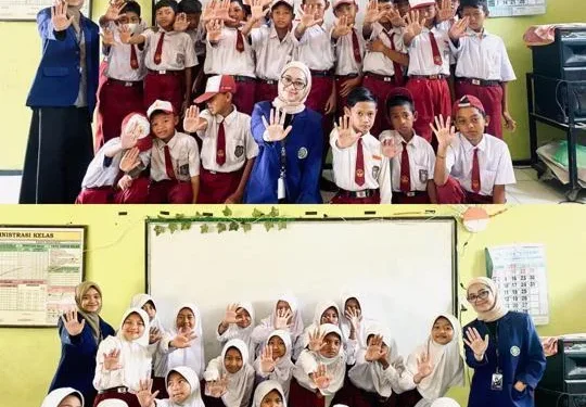 Foto bersama mahasiswa UM dengan siswa SD Wonorejo Kediri usai sosialisasikan PHBS.