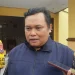 Kepala SMP Nasional Malang, Kukuh Widartono, saat berada di Polsek Sukun memberikan penjelasan soal perundungan siswanya. (Foto/M Sholeh)