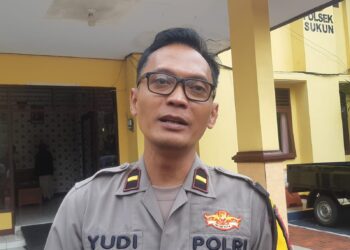 Kasi Humas Polresta Malang Kota, Ipda Yudi Risdiyanto, saat memberikan keterangan soal perundungan pelajar di Sukun, Kota Malang. (Foto/M Sholeh)