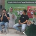 Area Head Gojek Malang, Irvan Yonas memaparkan program layanan #EmakHemat. (Foto/M Sholeh)