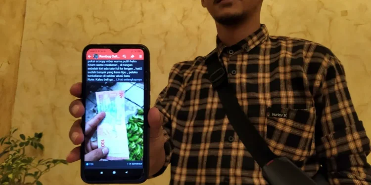 pengedar uang palsu
