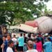Tampak truk molen terguling hingga ringsek di Jalan Raya Gadang Malang. Foto: Azmy