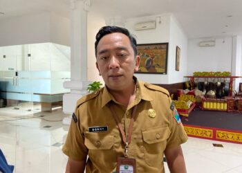 Kepala Dinsos-P3AP2KB Kota Malang, Donny Sandito, menjelaskan kondisi terbaru pelajar korban perundungan. (Foto/M Sholeh)