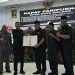 Pj Wali Kota Malang, Wahyu Hidayat dan Ketua DPRD Kota Malang, I Made Riandiana Kartika mengesahkan Perda Kota Layak Anak. (Foto/M Sholeh)