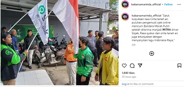 Pengemudi online mencium bendera sebagai bentuk syukur dan cinta tanah air karena diterima menjadi mitra Gojek sebagai aplikasi karya anak bangsa. Foto/dok Gojek