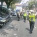 Mobil Kijang Innova naik ke median jalan di Singosari. Foto: Satlantas Polres Malang