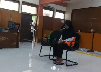 RM, terdakwa kasus dugaan penggelapan pajak saat menjalani persidangan di PN Malang. (Foto/dok for TM)