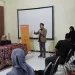 Corporate & Marketing Communication Head Ainul Yaqin saat mempresentasikan program pendampingan BTPN Syariah. Foto: Azmy