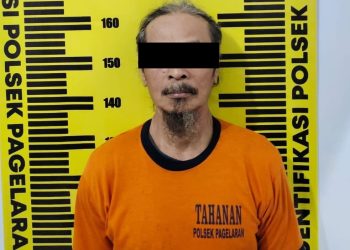 Tersangka dukun palsu, Rinang Pujiono usai ditangkap polisi. Foto: Polres Malang