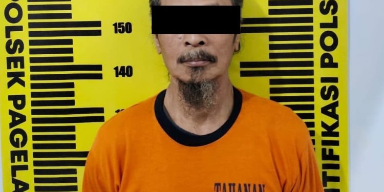 Tersangka dukun palsu, Rinang Pujiono usai ditangkap polisi. Foto: Polres Malang