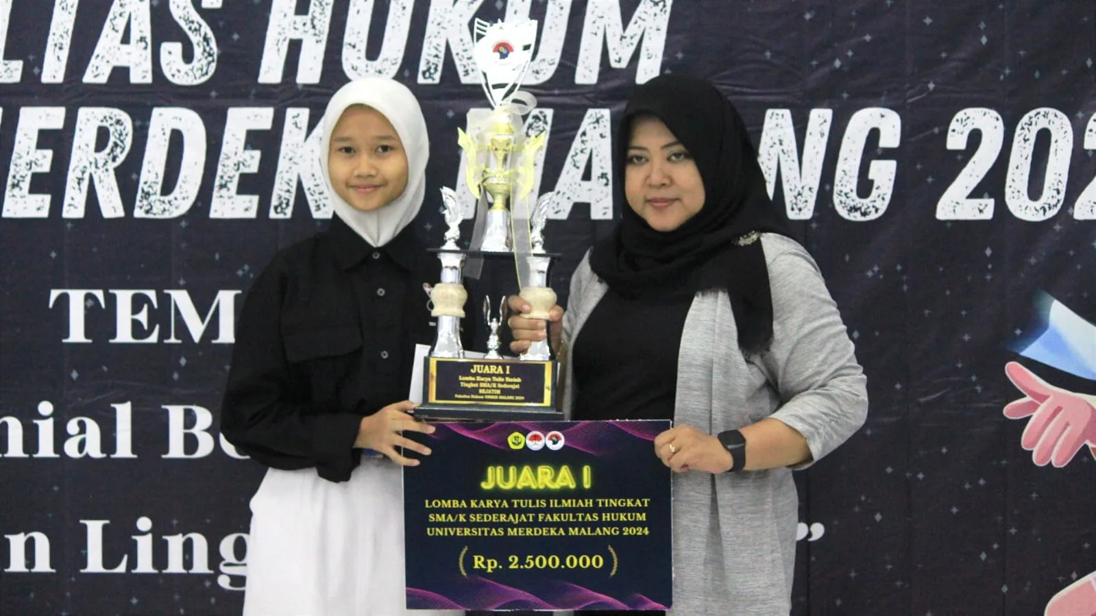 Juara I LKTI FH Unmer