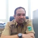 Koordinator PTSP/Fungsional Penata Perizinan DPMPTSP, Tauchid Bhaswara Kawasa, siap tinjau kembali IMB Golden Hill Hotel. Foto: Azmy