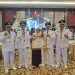 Kepala Bagian Hukum Kabupaten Malang, Prasetyani Arum mewakili Bupati Malang didampingi dua camat dan dua kepala desa menerima penghargaan dari Kemenkumham RI. Foto: Pemkab Malang
