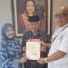 Sanusi dan Lathifah Shohib menerima rekom dari PDI Perjuangan. Foto: Tim Sembilan