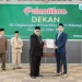 Dekan FH Unisma Dr. Arfan Kaimudin, SH, MH, saat dilantik Rektor Unisma Prof. Drs. H. Junaidi Mistar, M.Pd, Ph.D. Foto: Dok. Unisma