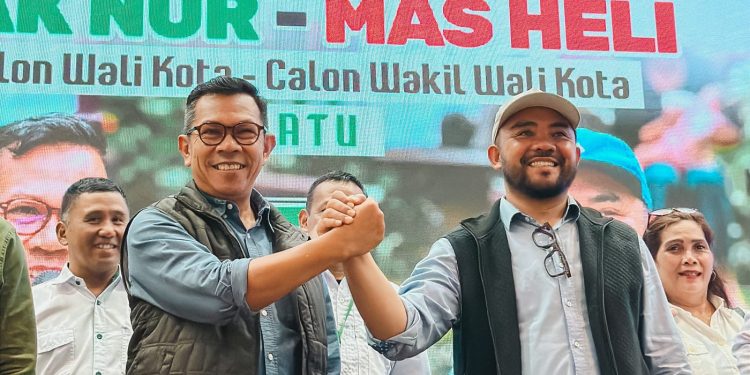 Nurochman dan Heli Suyanto, bakal pasangan calon Wali dan Wakil Wali Kota Batu yang mengusung misi kejayaan Kota Agropolitan hingga Industri Kreatif. Foto: Azmy