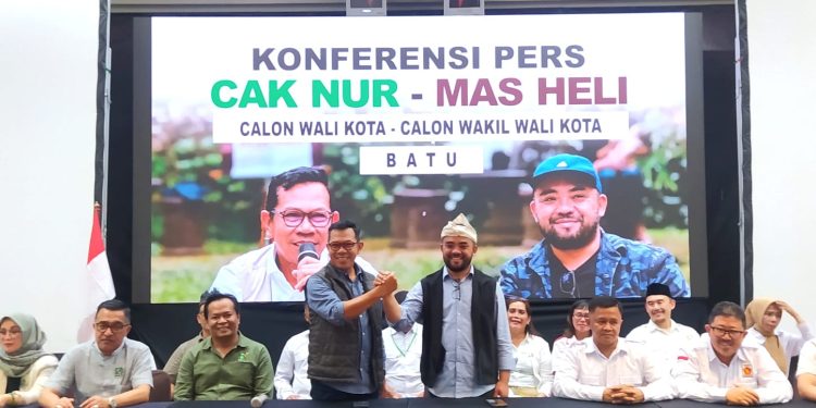 Nurochman dan Heli Suyanto mendeklarasikan diri secara resmi untuk maju sebagai pasangan calon di Pilwali Kota Batu 2024. Foto: Azmy
