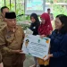 Bupati Malang, Sanusi memberikan bantuan secara simbolis kepada P4S. Foto: Aisyah Nawangsari Putri