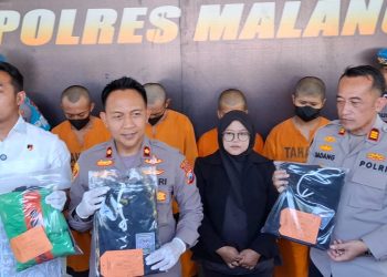 Tersangka pengeroyokan