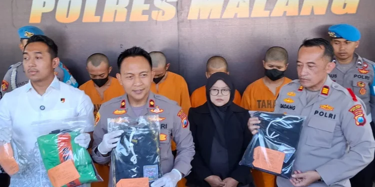 Tersangka pengeroyokan