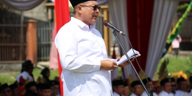 Plt Bupati Malang, Didik Gatot Subroto menyampaikan sambutan Menteri Agama RI. Foto: Pemkab Malang