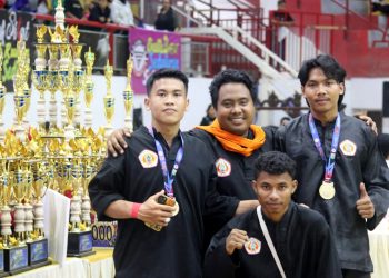 Dua pesilat ITN Malang keluar sebagai juara di ajang kejuaraan pencak silat. Foto/dok ITN Malang