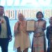 Penyerahan Resolusi Malang Autism Summit 2024 yang diserahkan Dr. Amelia A. Daeng, M.Psi didampingi CEO Tugu Media Group, Irham Thoriq (paling kiri) kepada perwakilan Pemerintah Kota Malang, Dr. Ida Ayu Made Wahyuni, S.H, M.Si, Sabtu (5/10/2024)./Foto: Tugu Media Group/Yona Arianto.