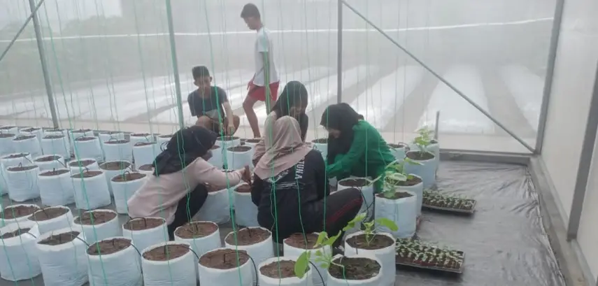 Greenhouse KWT Lembah Kuncung Kabupaten Trenggalek sebagai solusi meningkatkan kualitas tanaman anggrek. Foto/dok UM