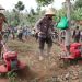 Pembajakan tanah lahan tidur menjadi lahan produktif oleh Kapolres Batu AKBP Andi Yudha Pranata dan Dinas Pertanian. Foto: Azmy