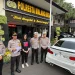 Satlantas Polresta Malang Kota menindak pengemudi mobil BMW berplat tak senonoh. (Foto/M Sholeh)