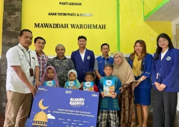 Penyaluran bantuan dari BRI Group ke Panti Asuhan Mawaddah Warohmah. Foto: BRI Malang