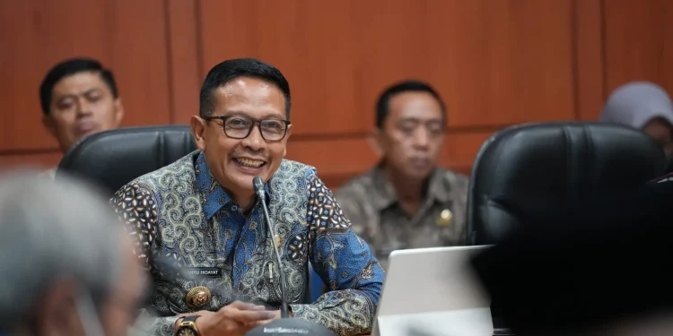 Wali Kota Malang, Wahyu Hidayat mempresentasikan inovasi pengentasan kemiskinan terpadu melalui PDKTSAM. (Foto/dok. Prokopim Setda Kota Malang)
