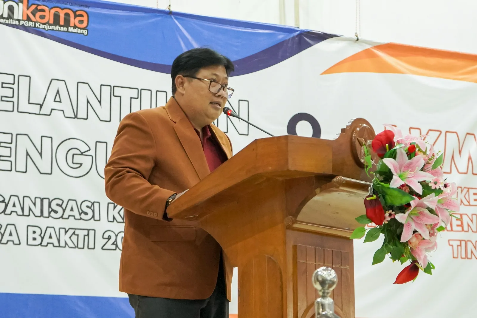 Sambutan Direktur Direktorat Kemahasiswaan dan Alumni, Dr. Andi Nu Graha, S.E, M.Si./Foto: Dok. Unikama.