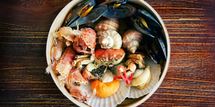 Rekomendasi tempat makan seafood di Malang. /Foto: Unsplash.com/Wu Yi.