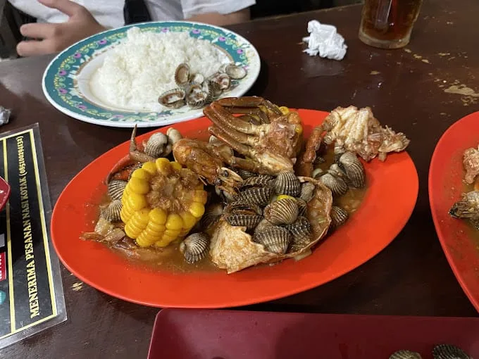 Menu seafood di Cak Tomo Oro-Oro Dowo Malang./Foto: Google Review/Faustina Jane Sirin.
