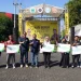Pemkot Batu memberikan secara simbolis subsidi BPJS Ketenagakerjaan gratis bagi pelaku UMKM dan petani di Kota Batu. Foto: Prokopim KWB