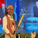 Joko Tebon, saat diundang memainkan didgeridoo di Istana Negara. Foto: Dok