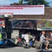 Spanduk penolakan KEK Singhasari sempat terpasang di pertigaan Jalan Tumapel. Foto: istimewa