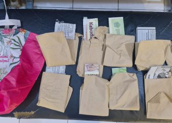 Barang bukti yang diamankan polisi dari korban penipuan gendam di Pasar Bululawang. Foto: Polres Malang