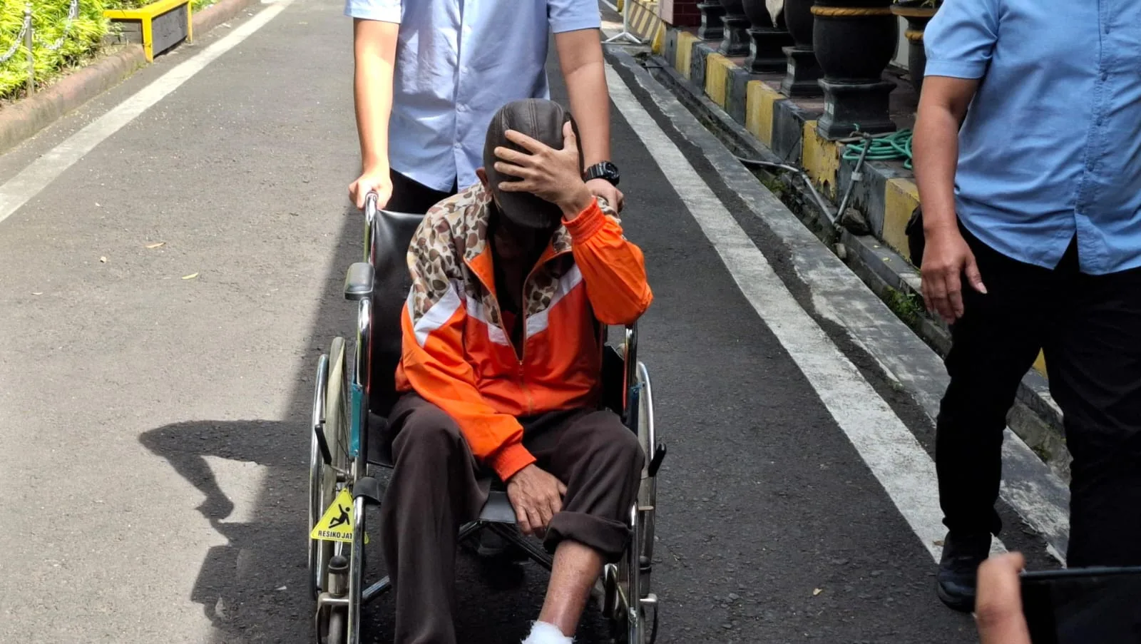 Tersangka Yudi Wahono saat digelandang di Polres Malang. Foto: Aisyah Nawangsari Putri