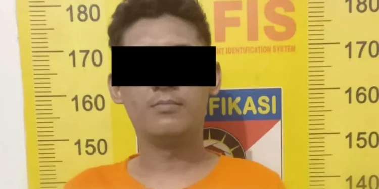 Tersangka IW warga Gondanglegi usai ditahan polisi. Foto: Polres Malang