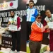 Seputih Hati Imani (kiri) dan Indra Mughni (kanan) saat pengalungan medali. Foto: KONI Kabupaten Malang