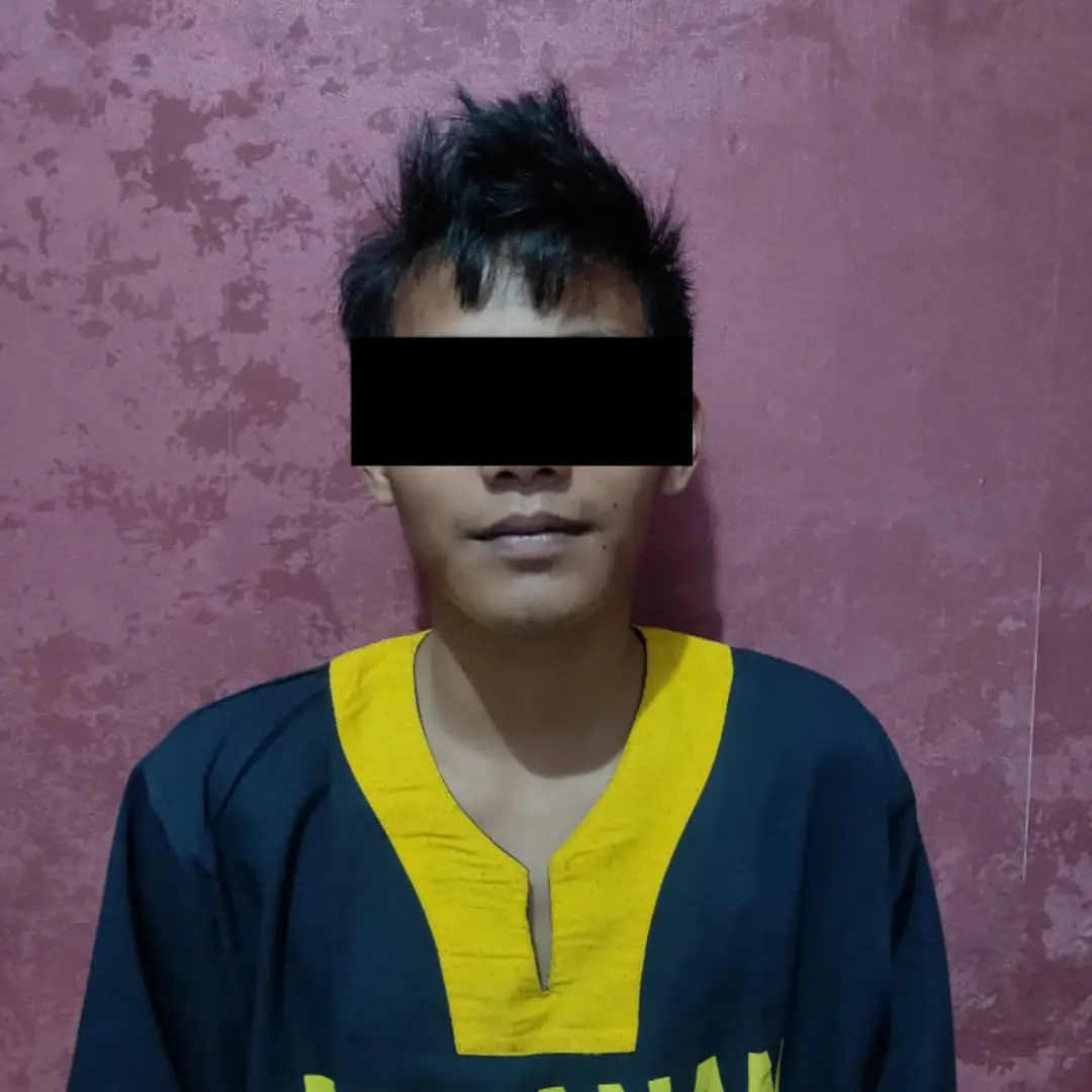 Tersangka KE