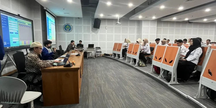 Tim Dosen UM tingkatkan kompetensi TAS melalui pelatihan pengarsipan dokumen berbasis digital./Foto: Tugumalang.id/Bagus Rachmad Saputra