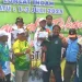 Alika Naila Putri, atlet cilik loncat indah Kota Batu digendong usai meraih medali emas Porprov Jatim 2025 pertamanya. Foto: KONI Kota Batu