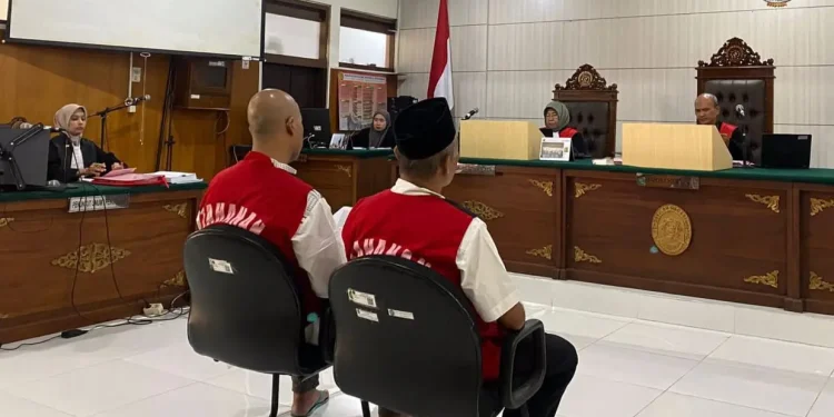 Sidang perdana 2 terdakwa kasus pemerasan pengurus Ponpes di Kota Batu. Foto: Kejari Kota Batu