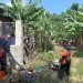 Petugas BPBD Kabupaten Malang menguras sumur warga Sitiarjo yang terdampak banjir. Foto: BPBD Kabupaten Malang
