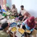 Tim PKM Unikama bersama pelaku UMKM Desa Legok Sukoraharjo Kepanjen kembangkan inovasi aneka produk unggulan dari Tempe Bungkil. /Foto: Dok. Unikama.